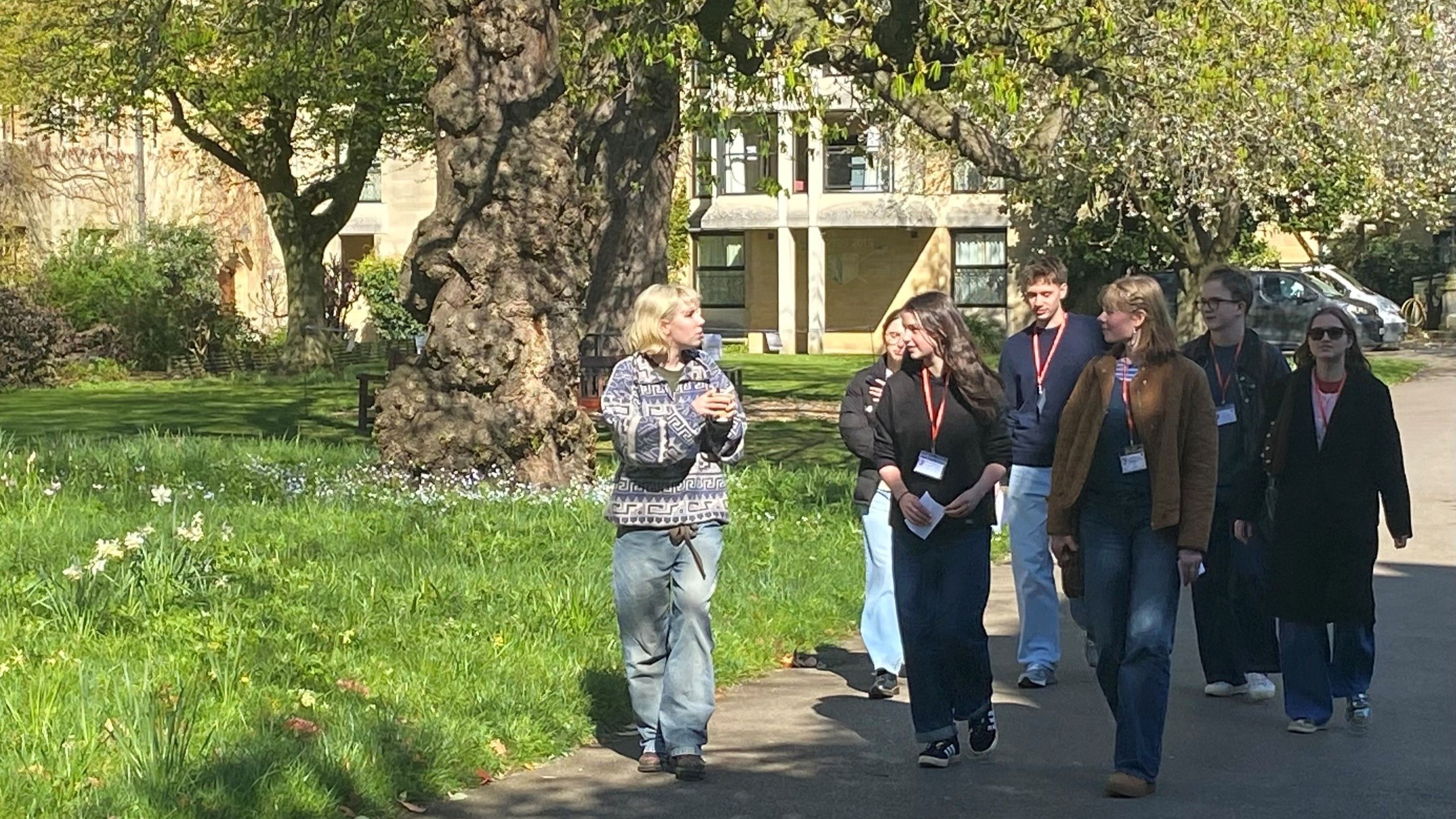 A group of students walking across Balliol's Garden Quad