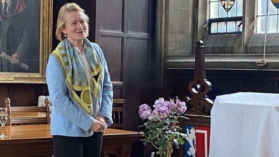 Dame Helen Ghosh speaking to Balliol staff in Hall.